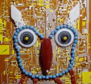 His beedy eyes start blinking at the push of a button... made from scrap! so cool